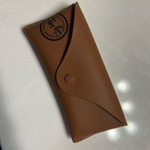 Raybans, slightly worn